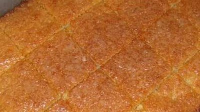 طريقة عمل البسبوسة العادية.. بالمكسرات والشربات تمتعوا بمذاق رائع 