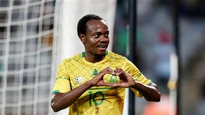 مدرب جنوب إفريقيا: بيرسي تاو ليس مثل محمد صلاح.. ويجب معاملته بشكل عادل