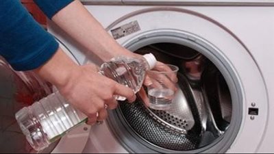 طريقة تنظيف الغسالة الأتوماتيك بالخل وملح الليمون.. ملابس نظيفة ومنعشة