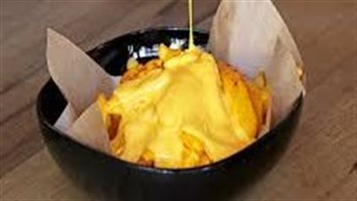 طريقة عمل صوص الجبنة الشيدر.. طعم لا يقاوم في البطاطس والمكرونة