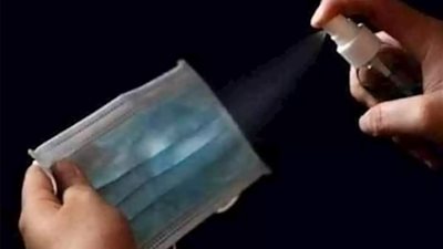 باحثون يحذرون من رش الكمامات بالكحول: يتلفها ويقلل فاعليتها