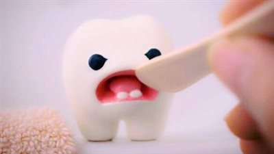 تنظيف أسنان الأطفال من الجير.. خطوات إزالة التكلس 
